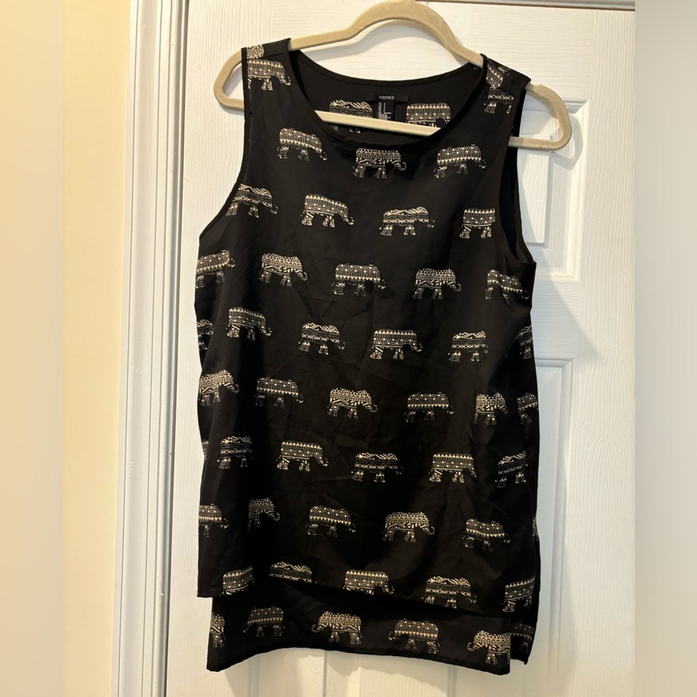 Size Small longer black elephant print sleeveless top